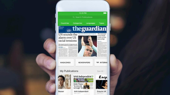 A mobile phone displaying an article from The Guardian on the PressReader app.