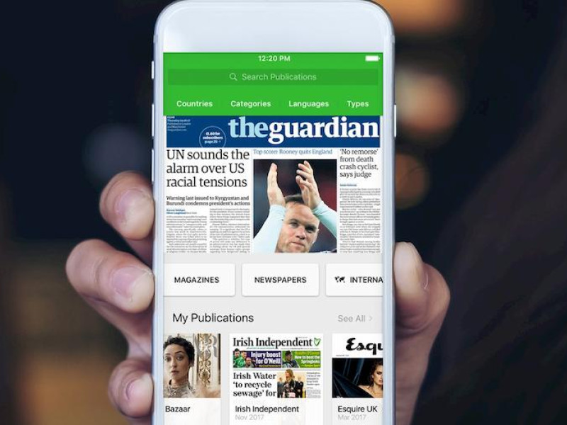 A mobile phone displaying an article from The Guardian on the PressReader app.