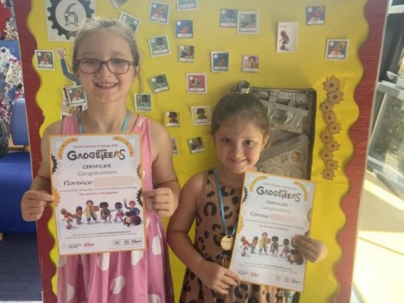 Florence and Connie showing off their certificates at Gainsborough Community Library.